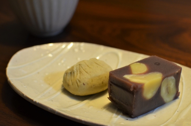 Kurikinton and chestnut yokan, traditional Japanese sweets made with chestnuts, served on a ceramic plate